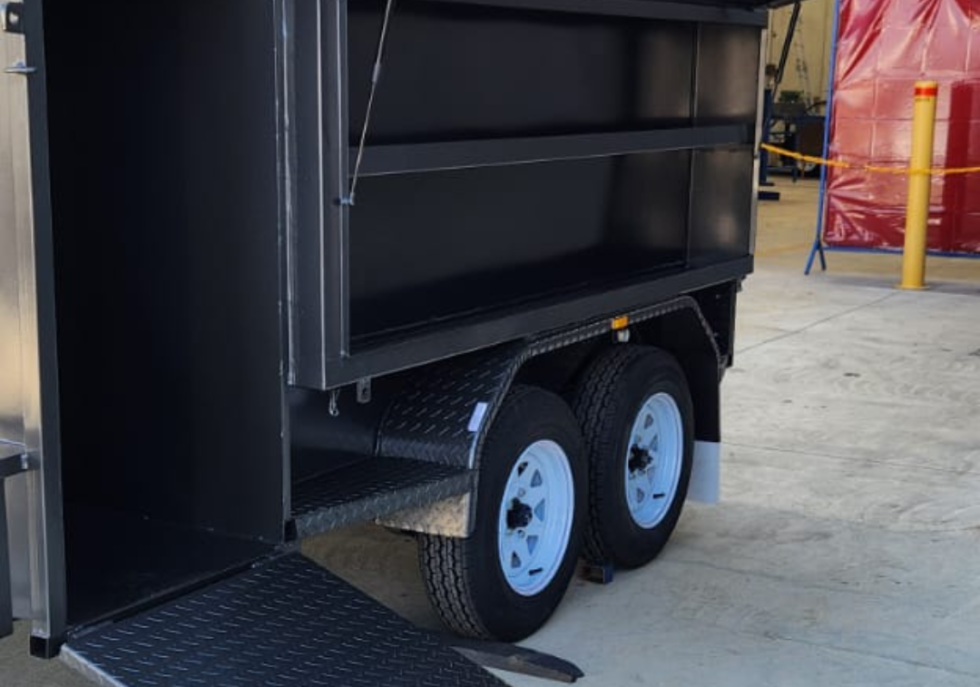 Lawn mowing trailers
